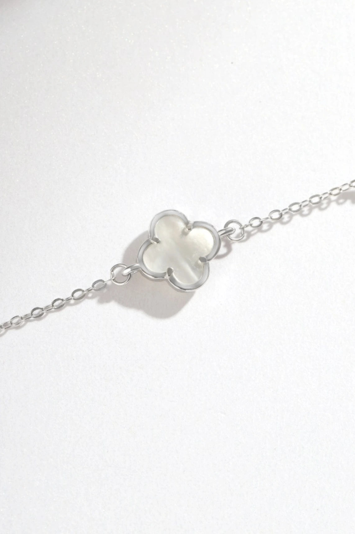 Amary Bracelet - White Flower Charm - 925 Sterling Silver - Silver Chain - Elegant Jewelry - Everyday Elegance - Handcrafted Bracelet - Nature Inspired - Symbol of Purity - Sophisticated Design - Rare Beauty - Matching Jewelry Available - Versatile Accessory - Premium Quality - Symbolic Jewelry - Gift Idea - Luxurious Packaging - Treasured Keepsake - Durable and Waterproof - La Lueure