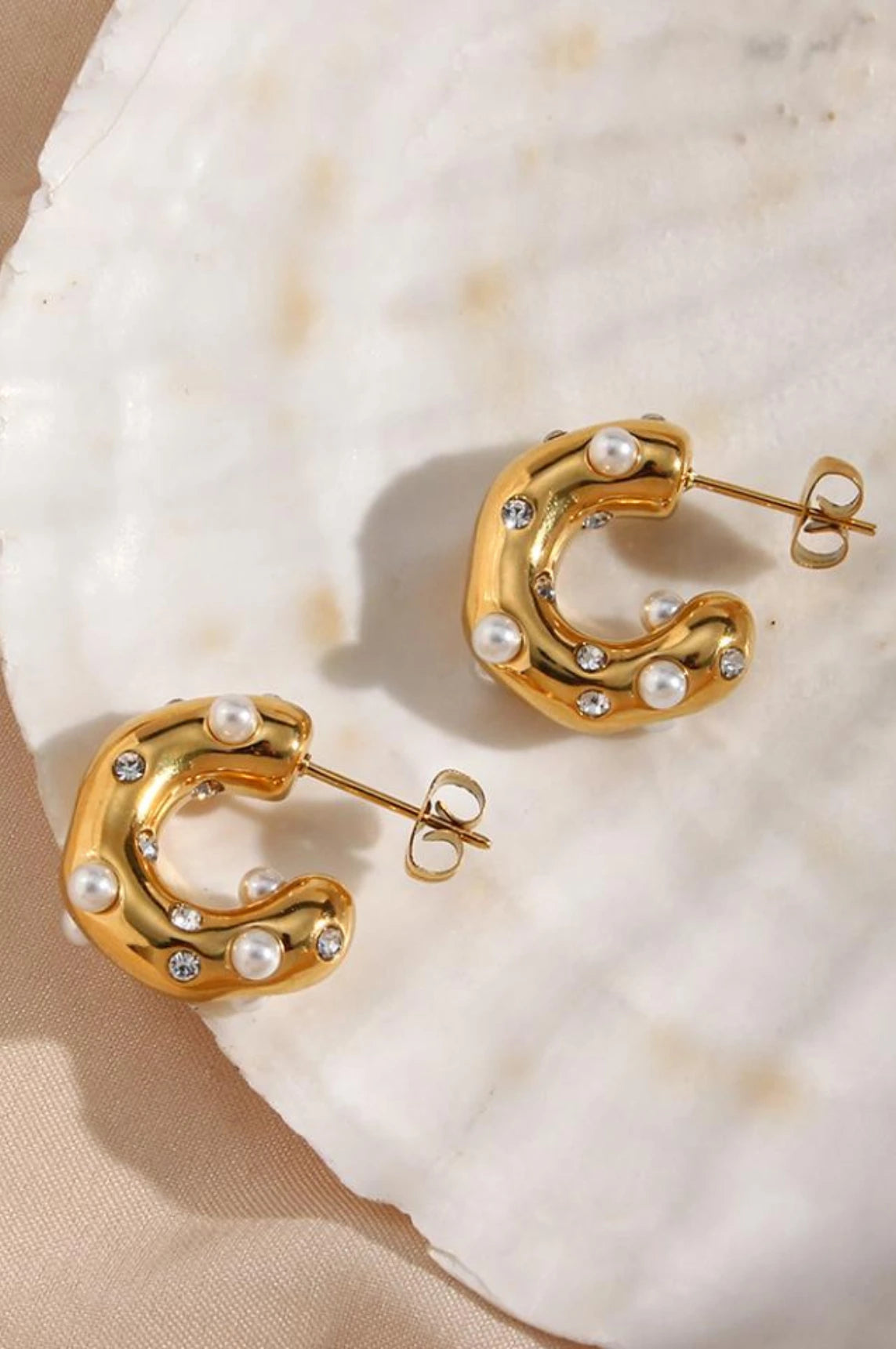 Gold earrings, diamond-accented earrings, pearl-accented earrings, luxurious earrings, elegant semi-bold earrings, unique statement earrings, sophisticated jewelry, stylish accessories, La Lueure