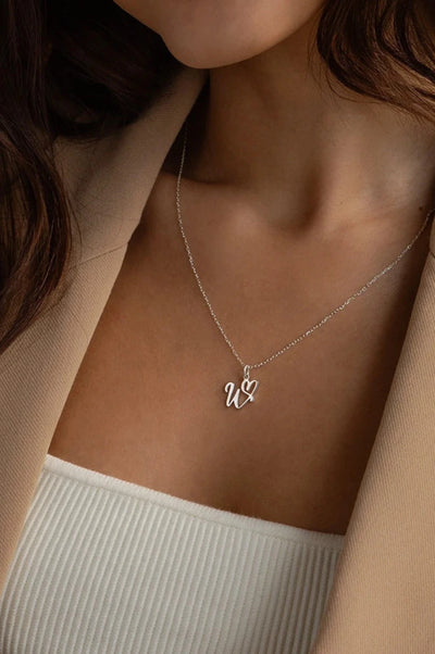 Heart initial necklace, personalized necklace, A-Z initial necklace, elegant initial jewelry, heart charm necklace, meaningful gift necklace, stylish personalized accessory, La Lueure