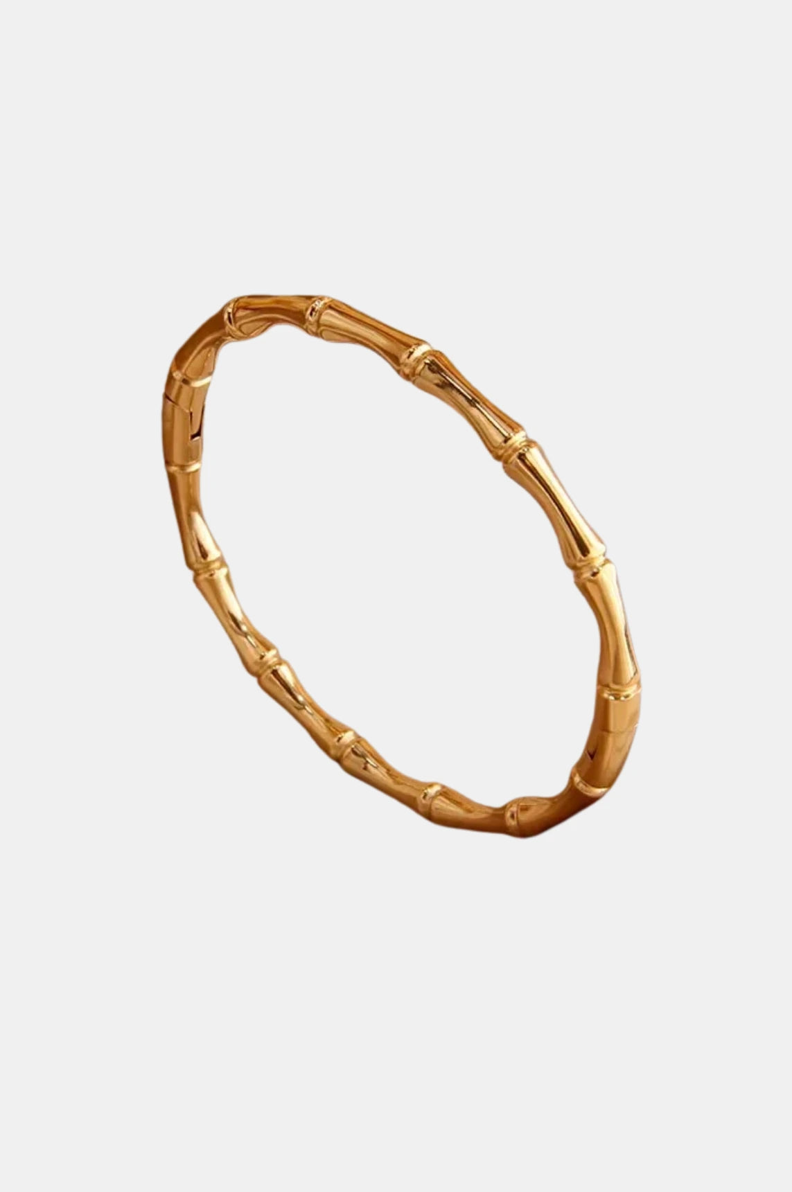 Bone-structured gold bangle, Sculpa Bangle, modern gold bracelet, elegant stainless steel bangle, waterproof gold jewelry, artistic bangle design, stylish gold accessory, timeless bracelet design, La Lueure